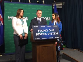 Wildrose MLAs Angela Pitt, Scott Cyr and Leela Aheer unveil a private members bill on March 14, 2017 that gives victims of non-consensual intimate image sharing better tools to seek damages. Photo by Stuart Thomson.