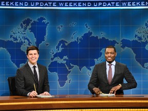 In this March 4, 2017 photo provided by NBC, Colin Jost and Michael Che, right, appear during Weekend Update segment of "Saturday Night Live" in New York. "Saturday Night Live" gets the summer off but "Weekend Update" will keep the political satire coming in prime-time. NBC said Tuesday, March 14, 2017, that four episodes of "Saturday Night Live: Weekend Update" will air at 9 p.m. Thursday starting Aug. 10 . (Will Heath/NBC via AP)