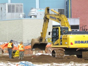 Work continues Tuesday on an expansion at Lambton College in Sarnia. A Construction Confidence Survey by the Ontario Construction Secretariat found contractors around the province have a positive outlook for the coming construction season. (Paul Morden/Sarnia Observer)