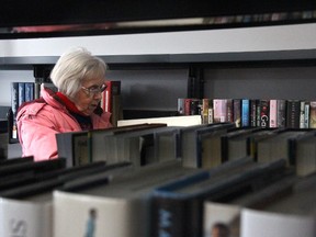 Betty Wiley, a local resident, reads a book at the Mt. Brydges Public Library, which reopened Tuesday, March 14. JONATHAN JUHA/STRATHROY AGE DISPATCH/POSTMEDIA NETWORK