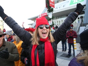 Ottawa Redblacks fans wait for the team to arrive at TD Place on Nov. 28, 2016. (Jean Levac/Postmedia)