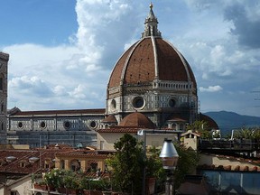 The dome of Florence Cathedral (Basilica di Santa Maria del Fiore), also known as Il Duomo di Firenze, and Giotto's Campanile rise above the rooftops, on July 31, 2011 in Florence, Italy. (GETTY)