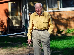 In this May 2014 photo, Michael Karkoc works in his yard in Minneapolis. (Richard Sennott/Star Tribune via AP)