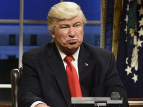 This Feb. 4, 2017 file photo released by NBC shows Alec Baldwin portraying President Donald Trump in the opening sketch of "Saturday Night Live," in New York. (Will Heath/NBC via AP, File)