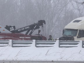 Jackknifed transport truck in the westbound lanes of Highway 401 between Division Street and Sydenham Road. Elliot Ferguson, Kingston Whig-Standard, Postmedia Network