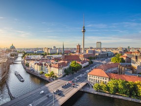 Aerial view of Berlin skyline with famous TV tower and Spree river in beautiful evening light at sunset, Germany. (Getty Images)