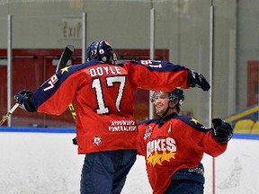Shawn Muir/OJHL Images
Wellington Dukes Nic Mucci celebrates his game winning goal with teammate Colin Doyle during the third period of the Dukes' 3-2 Game 7 victory over the Fury Tuesday night in Whitby.