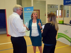 Whitecourt Mayor Maryann Chichak (centre) talks to Deputy Mayor Norm Hodgson (left) and Coun. Darlene Chartrand at the town’s March 8 Budget Open House (Jeremy Appel | Whitecourt Star).