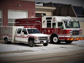 The new Whitecourt Fire Department's new truck (right) contrasted with the old (left). The new firetruck was built by Pierce Manufacturing in Appleton, Wis., and cost about $US720,000 (Whitecourt Fire Department | Submitted photo).
