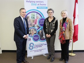 BRUCE BELL/THE INTELLIGENCER
Community Care for Seniors received a $25,000 grant to expand its social programs from the New Horizons for Seniors Program on Wednesday. Pictured at the Community Care King Street office in Picton are (from left) Bay of Quinte MP Neil Ellis, Community Care executive director Debbie MacDonald Moynes and Community Care board of directors president Margaret Werkhoven.