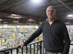 Jesse Dyck, marketing manager of North Star Windows and Doors, shows off the production space at its St. Thomas facility. (Times-Journal file photo)