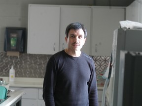 Brian Horrobin, pastor of First Baptist Church in Wallaceburg, shown in the church kitchen, says a church benevolent fund has been drained three times in two years in the fallout of people unable to pay their hydro bills turning to the church for help. (David Gough/Postmedia News)