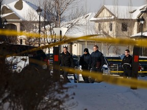Edmonton Police Service officers investigate a shooting near Hollands Way in the Hodgson neighbourhood of Edmonton on Thursday, March 9, 2017.
