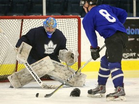 Cameron Zanussi of the Nationals has his eyes fixed on the puck as Ian McKinnon moves in during a practice drill at the Western Fair Sports Centre on Wednesday March 15, 2017. Zanussi needs to have a good series as they start their semifinals against the Chatham Maroons tomorrow night in Chatham. (MIKE HENSEN, The London Free Press)