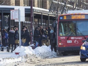 An OC Transpo bus in front of Les Terrasses de la Chaudiere in Gatineau. March 16,2017.