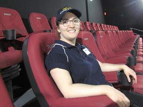 Amy Ferrera, a "cast member" at Galaxy Cinemas Sarnia, sits Tuesday in one of the two rows of new D-Box Motion seats, installed on March 10 and now being offered to customers in one of the site's screening rooms. Sarnia's movie theatre is the 70th Cineplex location in Canada to offer the technology.
Paul Morden/Sarnia Observer/Postmedia Network