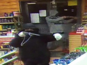 Police have released this photo of two male suspects wanted after a gas station in Maskwacis was robbed at gunpoint on Wednesday, March 15, 2017. EDMONTON