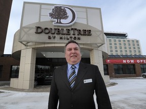 General Manager Grant McCurdy in front of the newly opened Doubletree Hilton Hotel replacing the old Mayfield Hotel in Edmonton, Ab. on Friday Jan. 312, 2014.