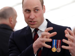 Prince William meets veterans and serving members of the British armed forces at a reception following the unveiling of the new memorial to members of the armed services who served and died in the wars in Iraq and Afghanistan at Victoria Embankment Gardens on March 9, 2017 in London, England. (Alastair Grant - WPA Pool/Getty Images)
