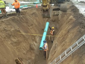 A picture showing Birnam Excavating installing new sanitary sewer mainline pipe on Adelaide Street. The Adelaide Street sewer replacement from Keefer Street to Burns Street was completed last fall and is part of the larger Princess Street project. Photo submitted by the Municipality of Strathroy-Caradoc.