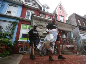 The Cannawide marijuana dispensary was among 43 marijuana dispensaries raided by Toronto police officers on May 26, 2016. Some of the charges against clerks who worked at the pot shops have now been withdrawn. (Cole Burston, The Canadian Press)