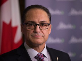 Finance Minister Joe Ceci talks to the media before reading the budget in the Alberta Legislature on Thursday March 16, 2017 in Edmonton. Greg Southam / Postmedia