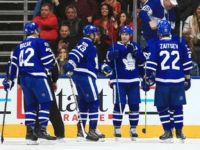 Tyler Bozak, Nazem Kadri, Mitch Marner and Nikita Zaitsev of the Toronto Maple Leafs celebrate a goal by James van Riemsdyk during an NHL game against the Detroit Red Wings at Air Canada Centre on March 7, 2017. (Vaughn Ridley/Getty Images)