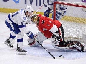 Tampa Bay Lightning's Gabriel Dumont tries to get the puck past Ottawa Senators' goalie Mike Condon during an NHL game on March 14, 2017. (THE CANADIAN PRESS/Justin Tang)