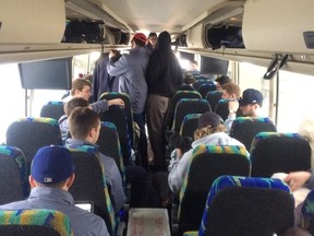 Members of the Queen’s Gaels men’s hockey team are shown on a bus as they travelled to Fredericton, N.B., to play in the University Cup. (Dylan Anderson/Queen’s Gaels)