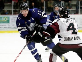London Nationals' Quinn Lenihan carries the puck against Chatham Maroons' Braden Henderson in the first period at Chatham Memorial Arena in Chatham, Ont., on Thursday, March 16, 2017. Mark Malone/Chatham Daily News/Postmedia Network