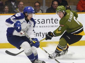 Sudbury Wolves forward Shane Bulitka (2) curls at the blueline as North Bay Battalion defenceman Zach Shankar (6) keeps an eye during the second period of OHL action at Memorial Gardens, Thursday. Shankar registered two assists in North Bay's 4-0 win with the two teams playing again tonight at Sudbury Community Centre. Dave Dale / The Nugget