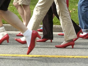 Sarnia's Walk a Mile in Her Shows fundraiser for the Women's Interval Home and Sexual Assault Survivors Centre is April 8, at Lambton Mall. Participants in London's walk are show in this file photo. 
File photo/ Postmedia Network