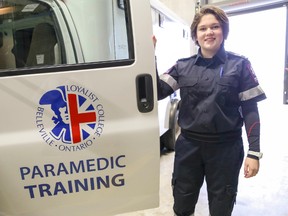 Loyalist College photo
Brooke Bradley, Loyalist College Paramedic student, stands with one of the college’s training vehicles. The Paramedic programs at Loyalist enable graduates to work in a variety of settings.