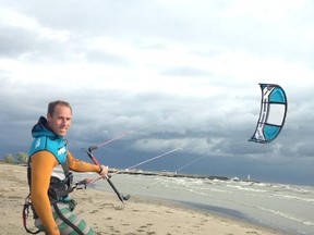 Tim Blanchard, owner of Surf Culture Canada, stands on the beach with his kitesurfing gear. The sport is expensive to get into and technique-heavy, but there are few places in Canada better to kitesurf than Mitchell's Bay. Handout/Postmedia Network