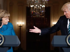 U.S. President Donald Trump and German Chancellor Angela Merkel participate in a joint news conference in the East Room of the White House in Washington, Friday, March 17, 2017. (AP Photo/Pablo Martinez Monsivais)