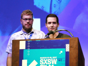 Chris Moberg, left, and Jared Young accept their SXSW film award on Tuesday in Austin, Texas.