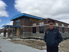St. Thomas police Chief Darryl Pinnell smiles just thinking how close the force’s new headquarters is to completion. The $11-million facility next to the Timken Centre will be ready for use by May or June. Construction crews are working on the interior, installing permanent fixtures, ceilings and floors. (Jennifer Bieman/Times-Journal)