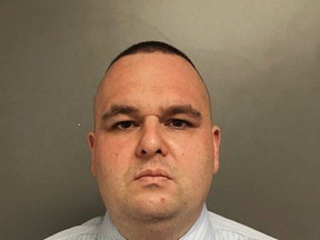 This Friday, March 17, 2017, photo provided by the Montgomery County District Attorney's Office in Norristown, Pa., shows former Pennsylvania State Police trooper Joseph Miller, charged Friday with the 2014 shooting that killed his pregnant wife JoAnna Miller and their newborn baby. (Montgomery County District Attorney's Office via AP)