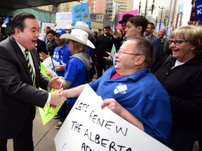 Jason Kenney arrived on Stephen Avenue in his blue Dodge truck prior to the PC Alberta's 2017 Leadership Election at the Telus Convention Centre in Calgary, Alta., on March 17, 2017. Kenny shook hands with his supporters and spoke with media before heading inside. Ryan McLeod/Postmedia Network