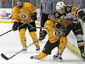 Kingston Frontenacs Sergey Popov takes Hamilton Bulldogs Marian Studenic off the puck during the first period of Ontario Hockey League action at the Rogers K-Rock Centre in Kingston, Ont. on Friday March 17, 2017. Fronts defeated the Bulldogs 5-3. Steph Crosier/Kingston Whig-Standard/Postmedia Network