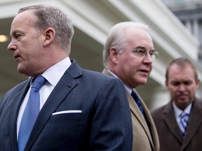 From left, White House press secretary Sean Spicer, Health and Human Services Secretary Tom Price, and Budget Director Mick Mulvaney, arrive to speak outside the West Wing of the White House in Washington, Monday, March 13, 2017, after Congress' nonpartisan budget analysts reported that 14 million people would lose coverage next year under the House bill dismantling former President Barack Obama's health care law. (AP Photo/Andrew Harnik)