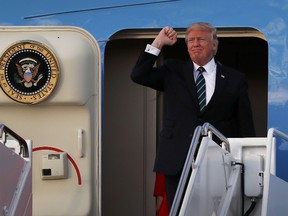 U.S. President Donald Trump arrives on Air Force One at the Palm Beach International Airport to spend part of the weekend at Mar-a-Lago resort on March 17, 2017 in West Palm Beach, Florida. President Trump has made numerous trips to his Florida home since the inauguration. (Photo by Joe Raedle/Getty Images)