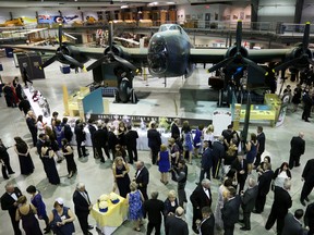 Tim Miller/Intelligencer File Photo
Guests mingle during the 2016 Invisible Ribbon Gala at the National Air Force Museum of Canada. This year's gala takes place on May 13.