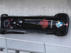 Canada's Kaillie Humphries and Melissa Lotholz speed down the track during the first run of the women's competition for the Bobsleigh World Cup at the Alpensia Sliding Centre in Pyeongchang, South Korea, on Saturday, March 18, 2017. (Lee Jin-man/AP Photo)
