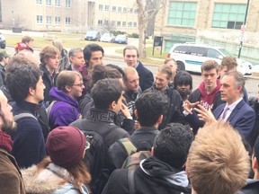 University of Toronto psychology professor Jordan Peterson, speaks with audience members outside the hall where he gave a talk at Western University. (Norman De Bono The London Free Press)