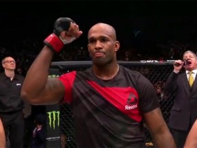 Jimi Manuwa raises his arm in victory after defeating Corey Anderson at UFC's London event on Saturday, March 18, 2017. (UFC)