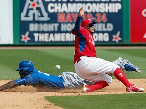 Promising Jays outfield prospect Anthony Alford (left) has impressed manager John Gibbons. He was optioned to the Jays’ minor league camp. (Stan Behal/Toronto Sun)