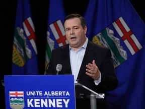 Newly-elected leader of the Alberta PC party Jason Kenney answers questions at a news conference in a Calgary hotel, Sunday, March 19, 2017. THE CANADIAN PRESS/Todd Korol