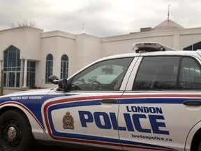 A London police car sits in the London Mosque parking lot on Sunday March 19, 2017 after a 24-year-old man was detained by police for uttering death threats about shooting people at the mosque during noon prayers. (MIKE HENSEN, The London Free Press)