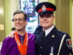 Staff-Sgt. Jody Armstrong, with Special Olympian Darren Dykstra, is one of two Kingston Police officers nominated for Police Association of Ontario's Police Services Hero of the Year Awards. (Supplied photo)